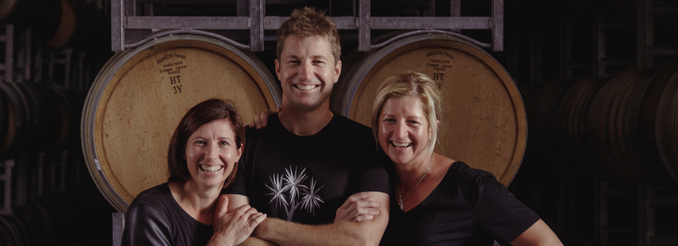Three people at Dog Point Vineyard